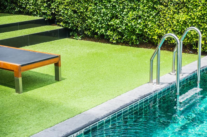 what to put under artificial grass for drainage