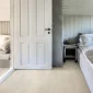 Kahrs-Engineered-Wood-Coconut-Cream-2-Strip-room1-1.webp